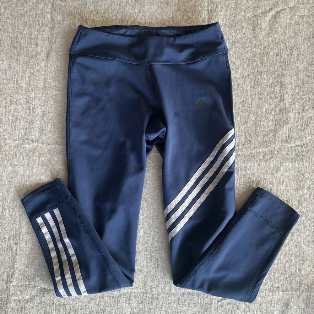 Adidas Women's Run 3-Stripes 7/8 Tights in color tech indigo.